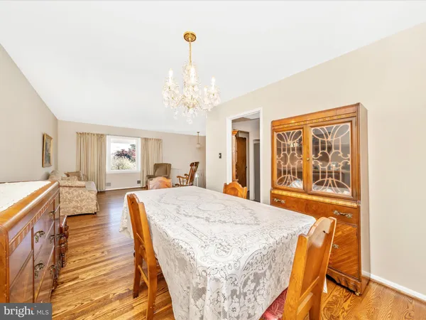 a very nice looking dining room with a table and chairs