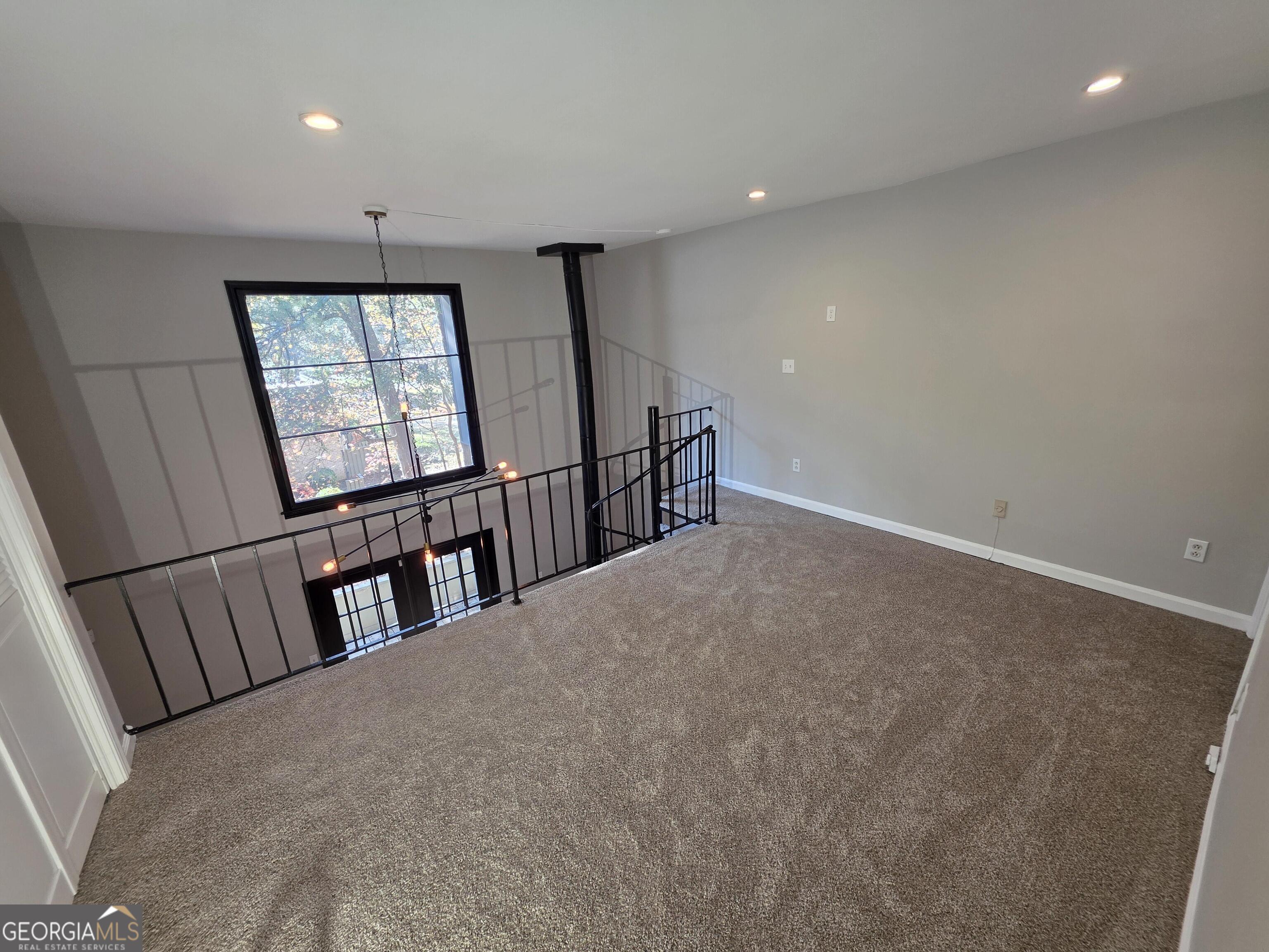 123 Elysian Way Northwest Atlanta, GA 30327 - Photo 16 of 18 a view of gallery with wooden floor