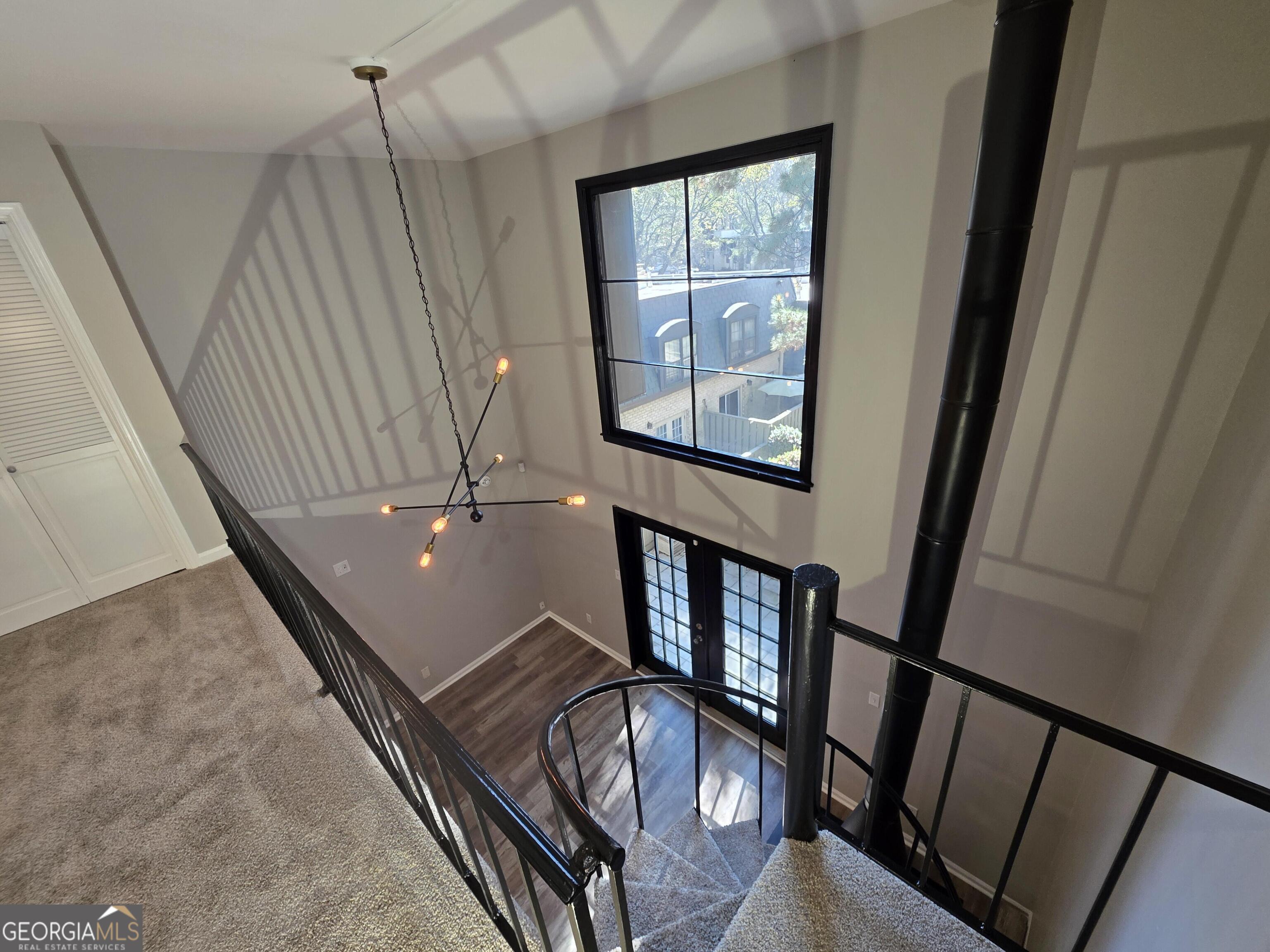123 Elysian Way Northwest Atlanta, GA 30327 - Photo 18 of 18 a front view of a house with staircase