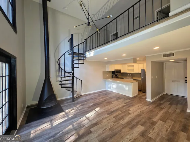 a view of a hallway view with staircase