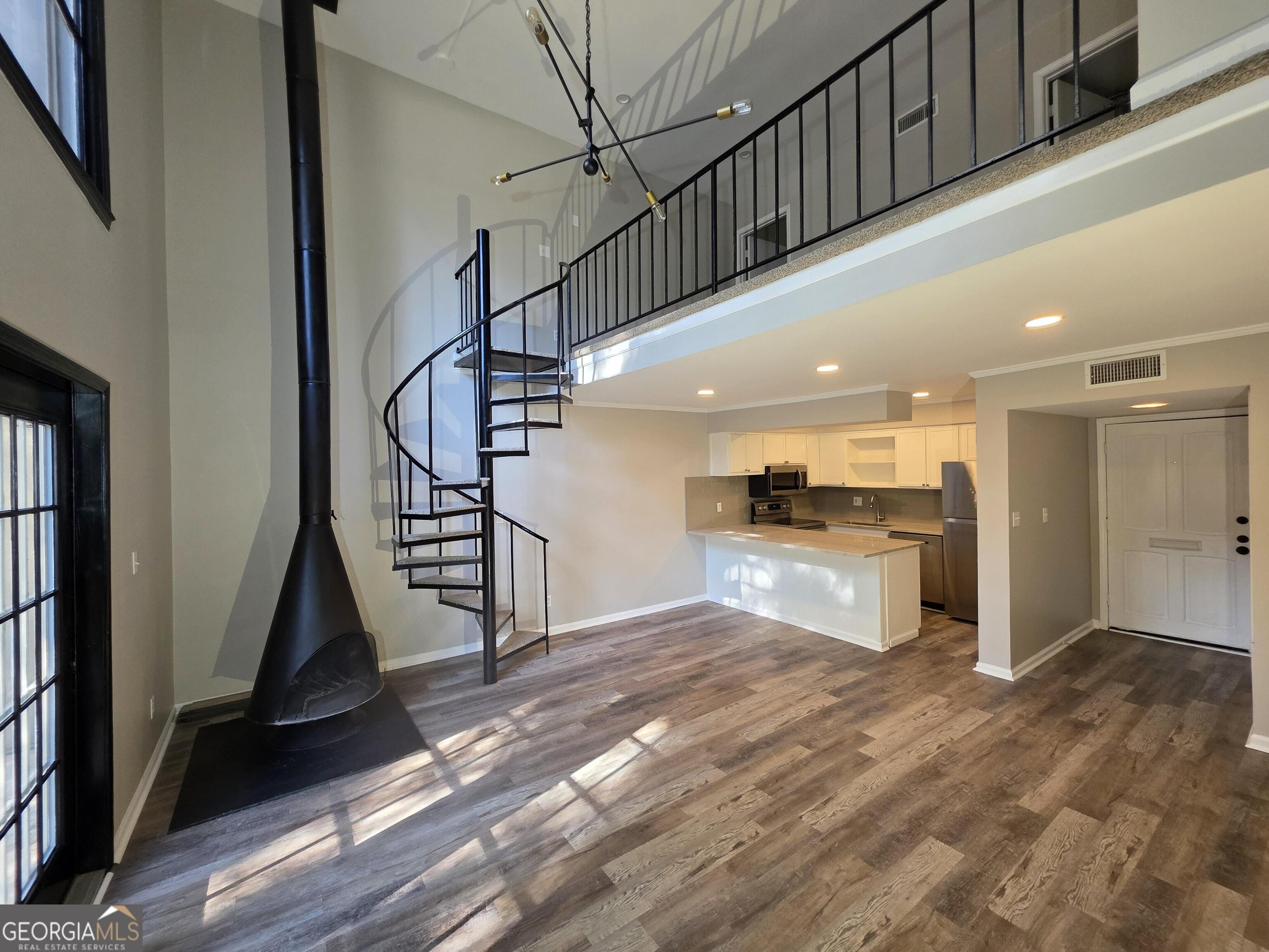 123 Elysian Way Northwest Atlanta, GA 30327 - Photo 2 of 18 a view of a hallway view with staircase