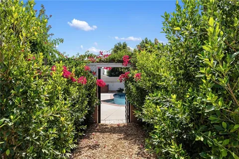a house view with a garden space