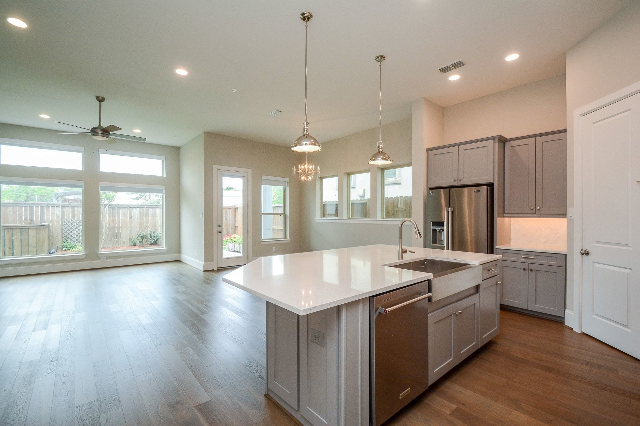 1407 Arkley Way Houston, TX 77055 - Photo 15 of 41 a kitchen with stainless steel appliances granite countertop a sink a oven and a refrigerator