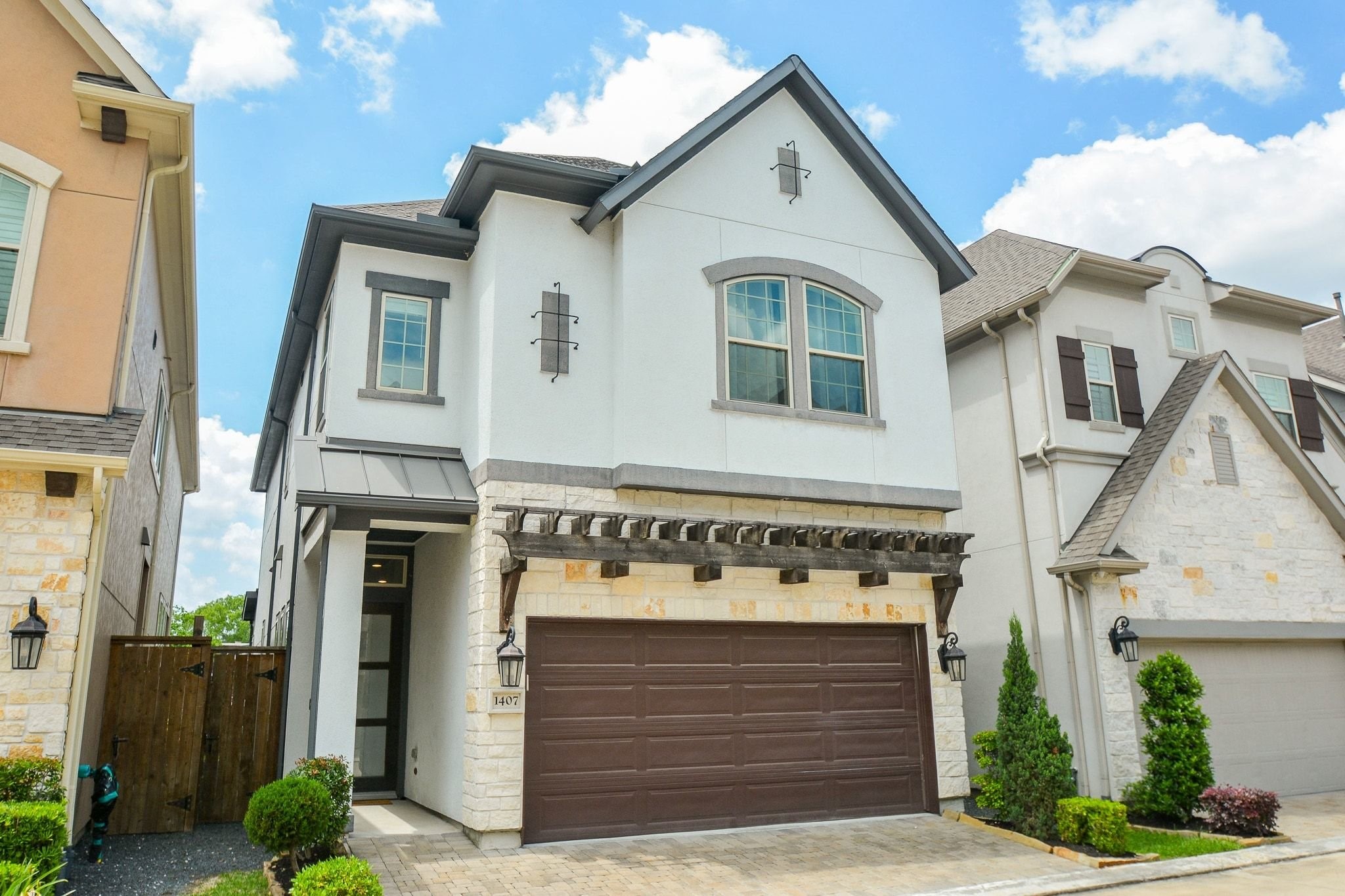1407 Arkley Way Houston, TX 77055 - Photo 2 of 41 a front view of a house with garage