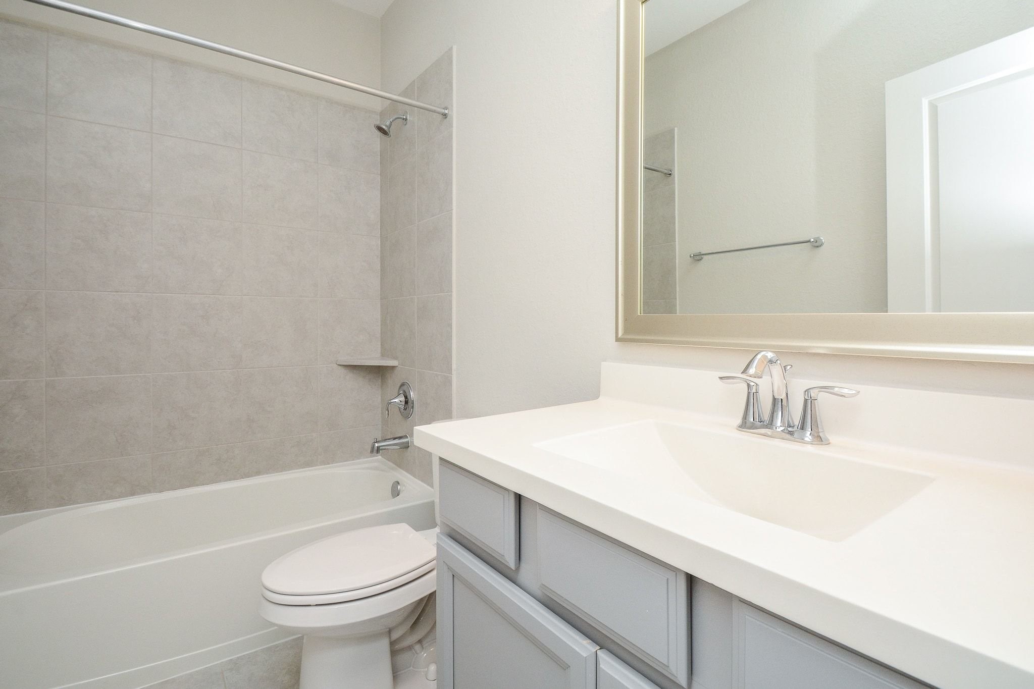 1407 Arkley Way Houston, TX 77055 - Photo 30 of 41 a bathroom with a sink toilet vanity and shower
