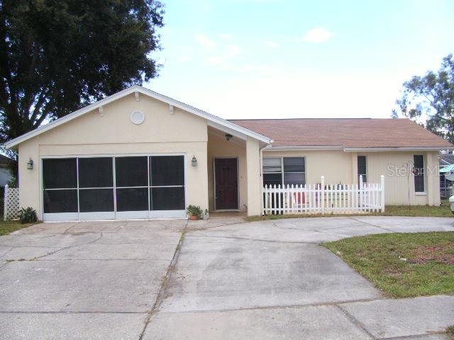 7137 Orchid Lake Road New Port Richey, FL 34653 - Photo 1 of 1 front view of a house with a yard