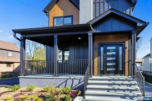 a view of a house with a small porch