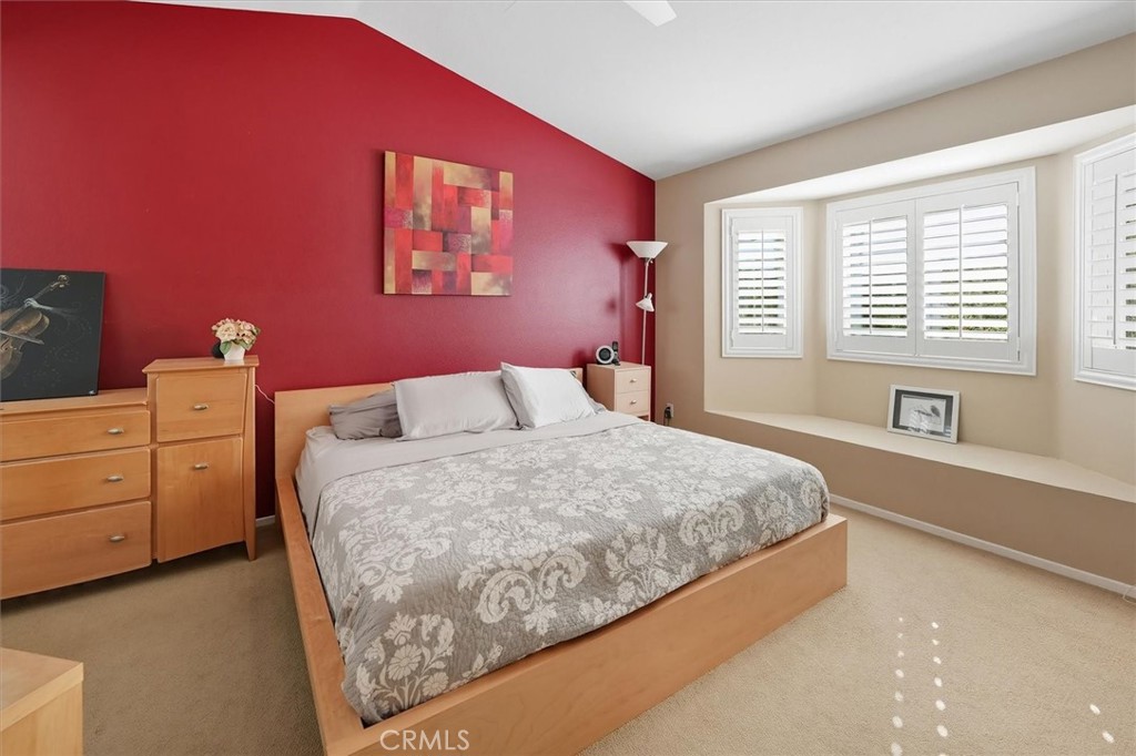 31347 Quail Valley Road Castaic, CA 91384 - Photo 14 of 41 a bedroom with a bed and a dresser