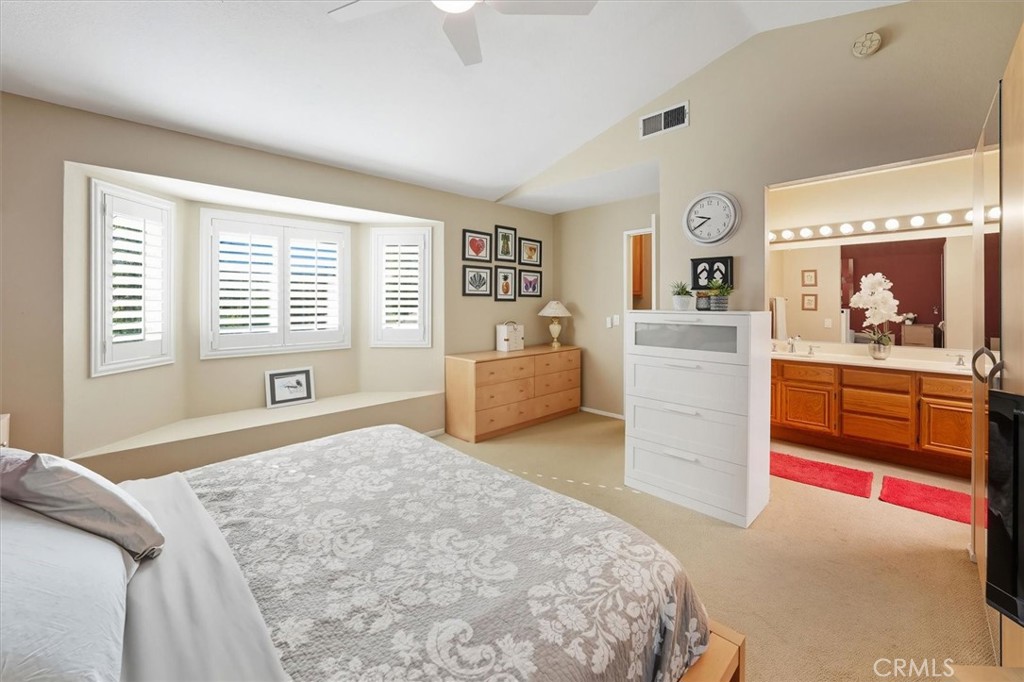 31347 Quail Valley Road Castaic, CA 91384 - Photo 17 of 41 a bedroom with a bed and a dresser