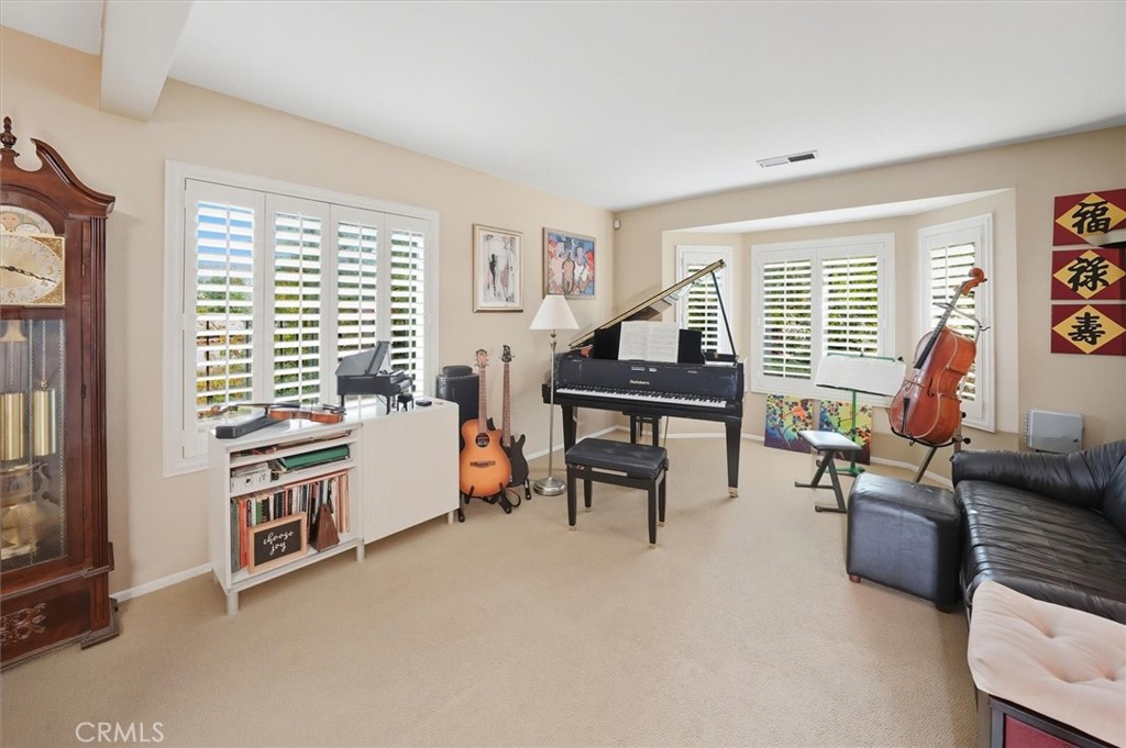 31347 Quail Valley Road Castaic, CA 91384 - Photo 3 of 41 a bedroom with furniture and a window