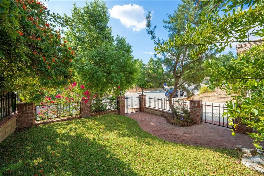 31347 Quail Valley Road Castaic, CA 91384 - Photo 33 of 41 a view of a park with bench and trees