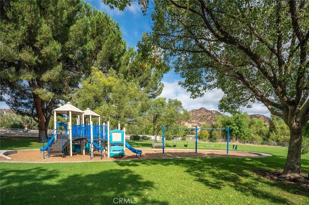 31347 Quail Valley Road Castaic, CA 91384 - Photo 38 of 41 a view of a park with large trees and a big yard