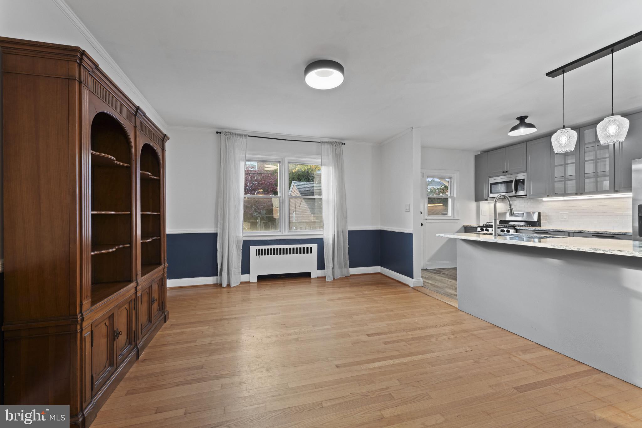 3712 Monterey Road Baltimore, MD 21218 - Photo 13 of 40 a view of kitchen and wooden floor