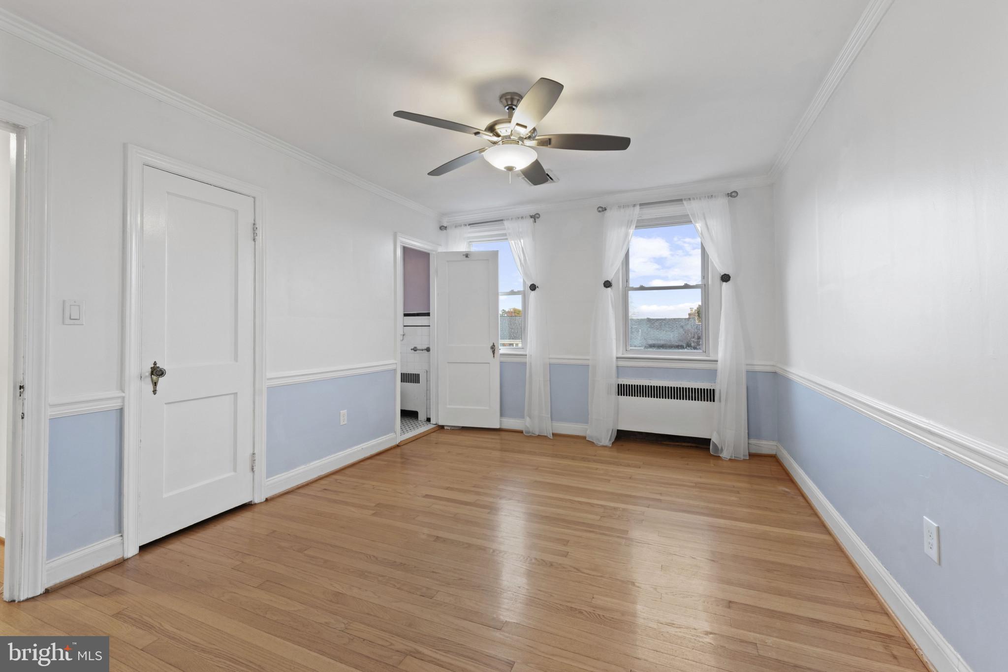 3712 Monterey Road Baltimore, MD 21218 - Photo 17 of 40 a view of an empty room with a window