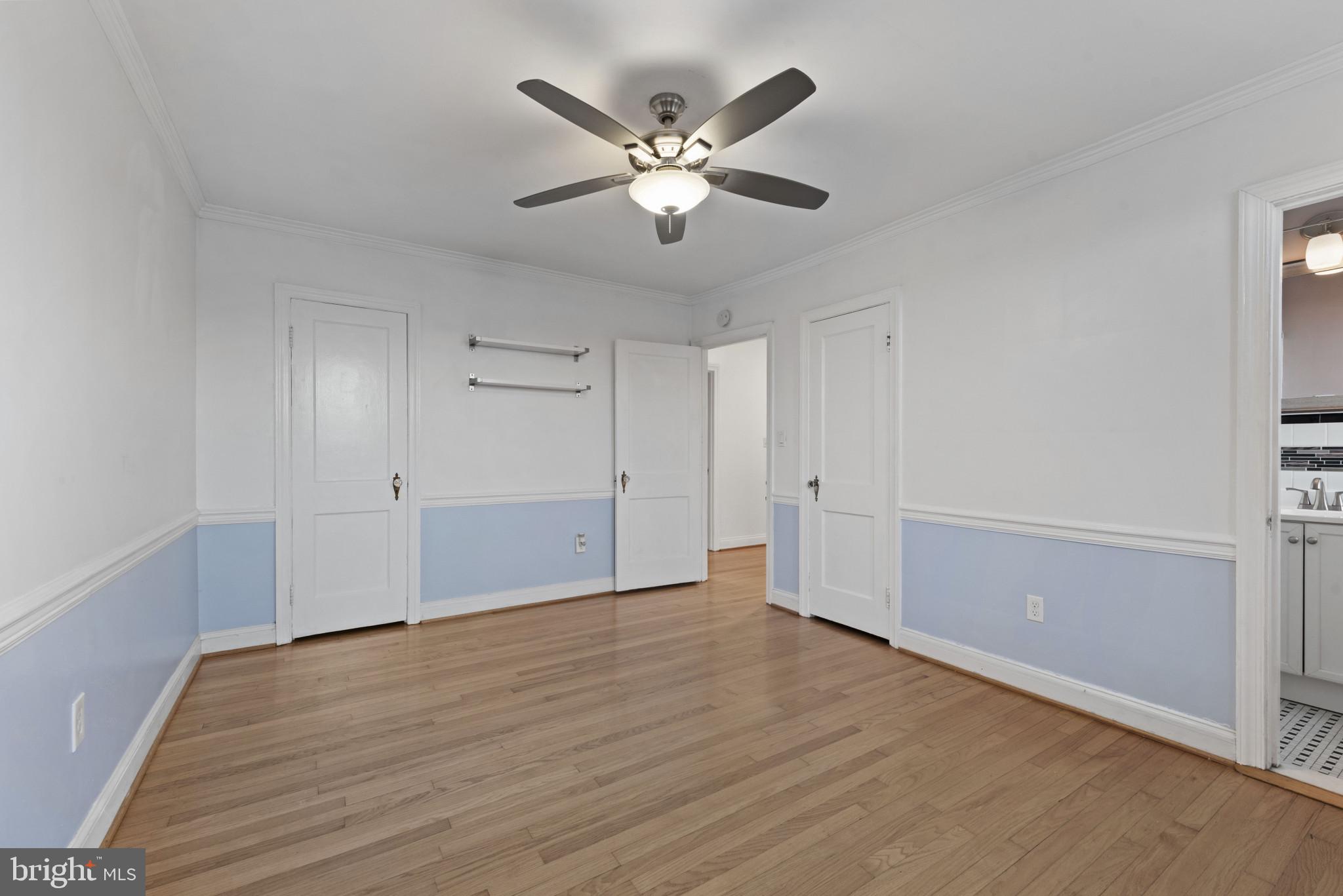 3712 Monterey Road Baltimore, MD 21218 - Photo 18 of 40 a view of an empty room with wooden floor