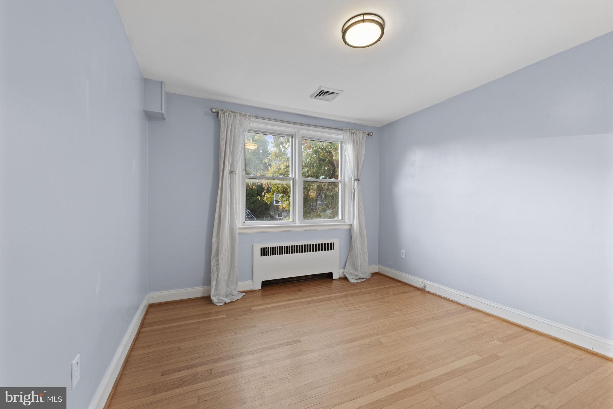 3712 Monterey Road Baltimore, MD 21218 - Photo 21 of 40 an empty room with a window