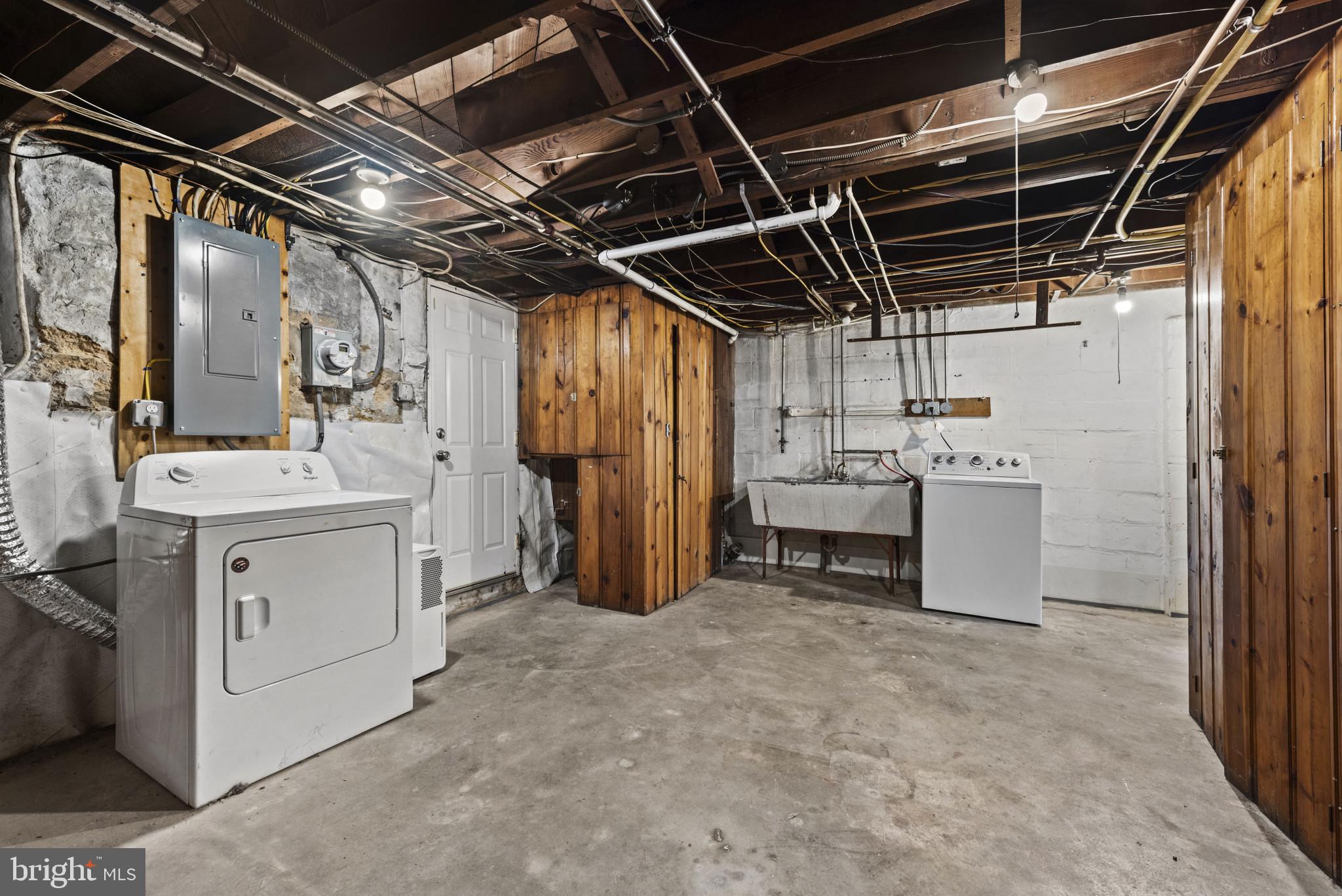 3712 Monterey Road Baltimore, MD 21218 - Photo 30 of 40 a utility room with dryer and washer