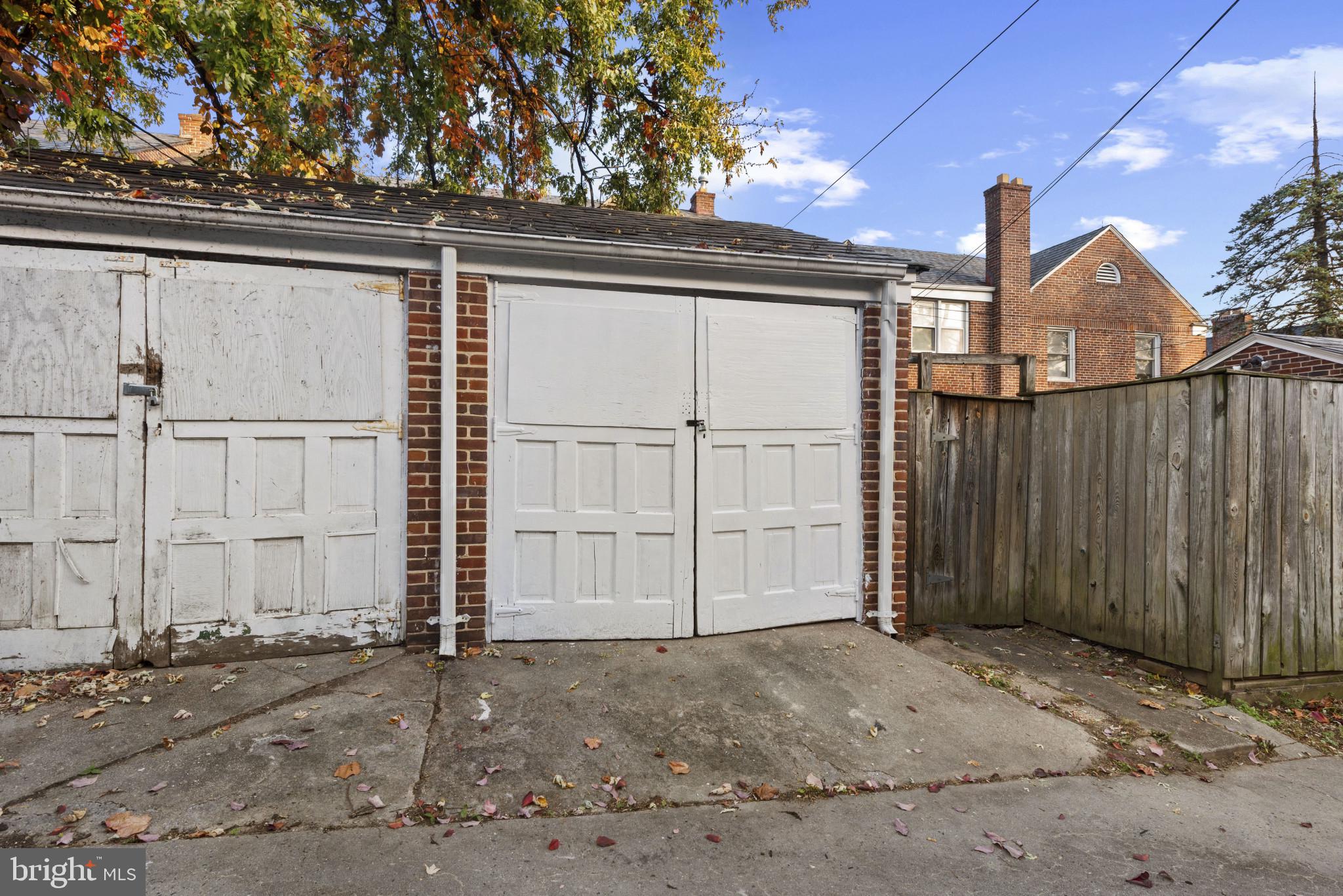 3712 Monterey Road Baltimore, MD 21218 - Photo 36 of 40 a view of a house with a wooden fence