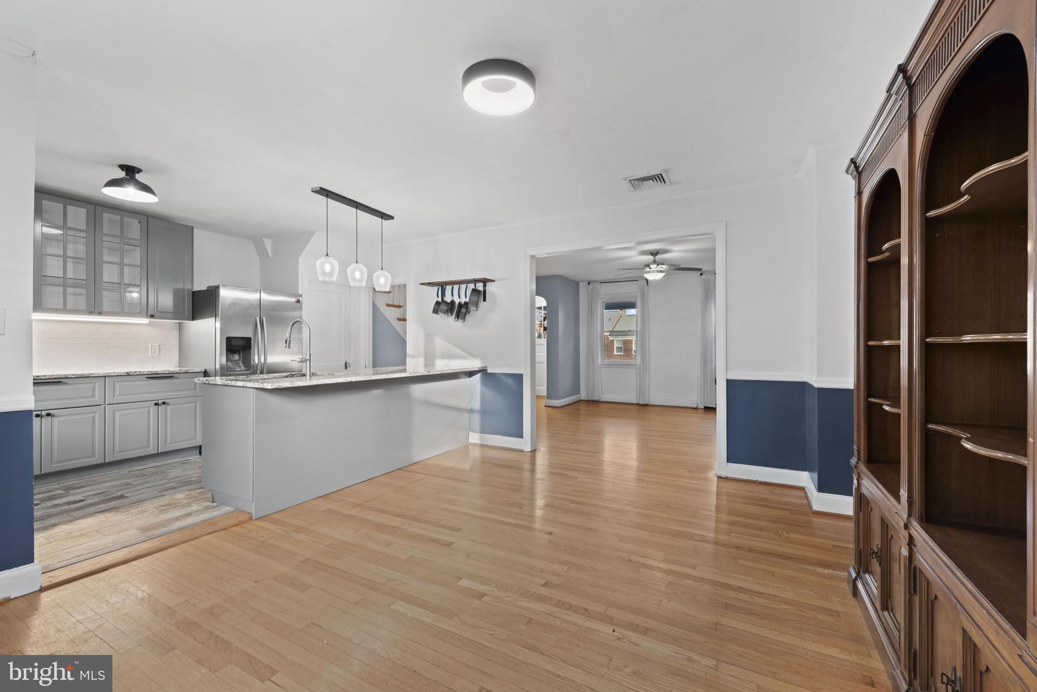3712 Monterey Road Baltimore, MD 21218 - Photo 10 of 40 a view of kitchen with cabinets and wooden floor