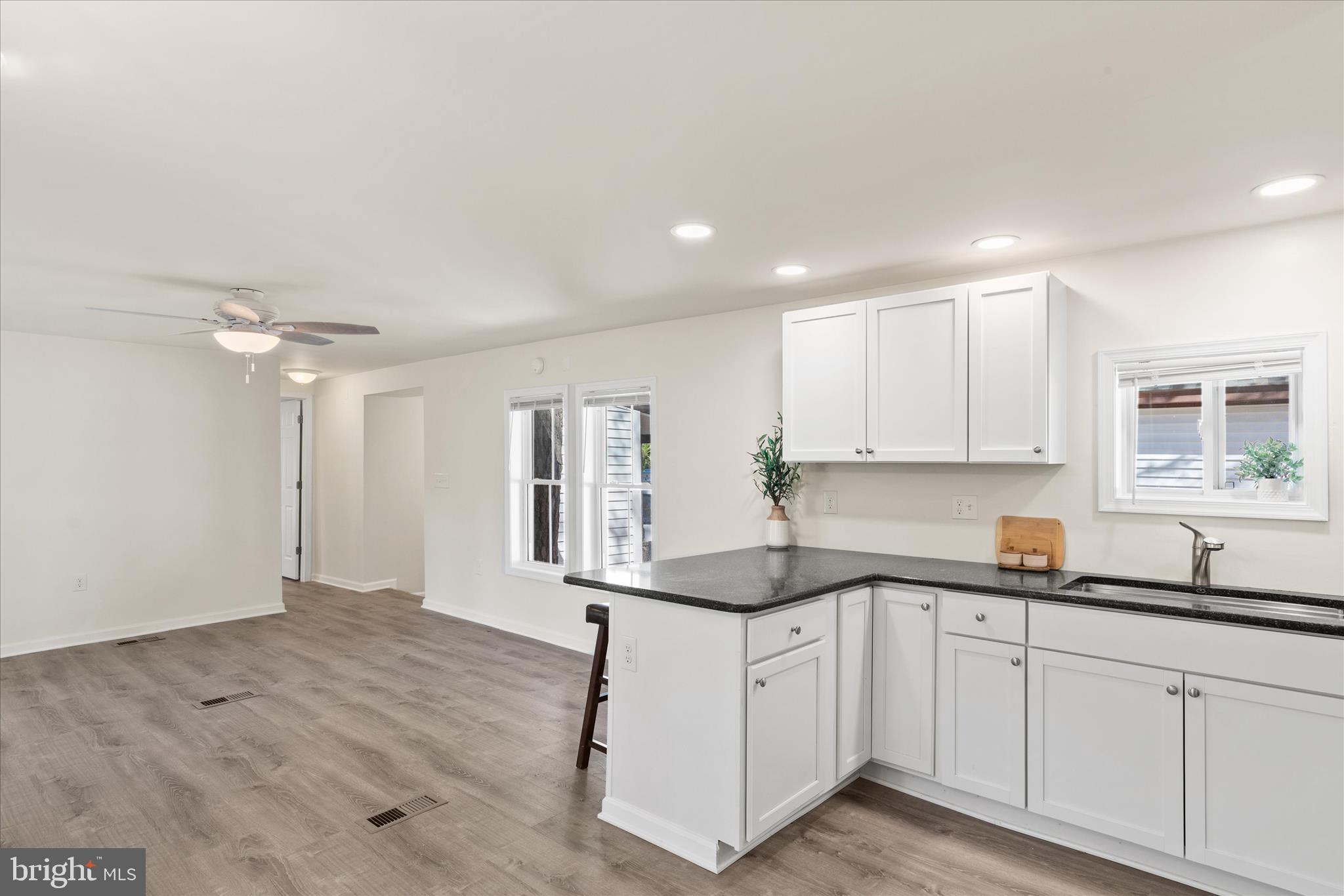 26465 Mason Webster Road Princess Anne, MD 21853 - Photo 18 of 63 Kitchen Overlooks Living Room