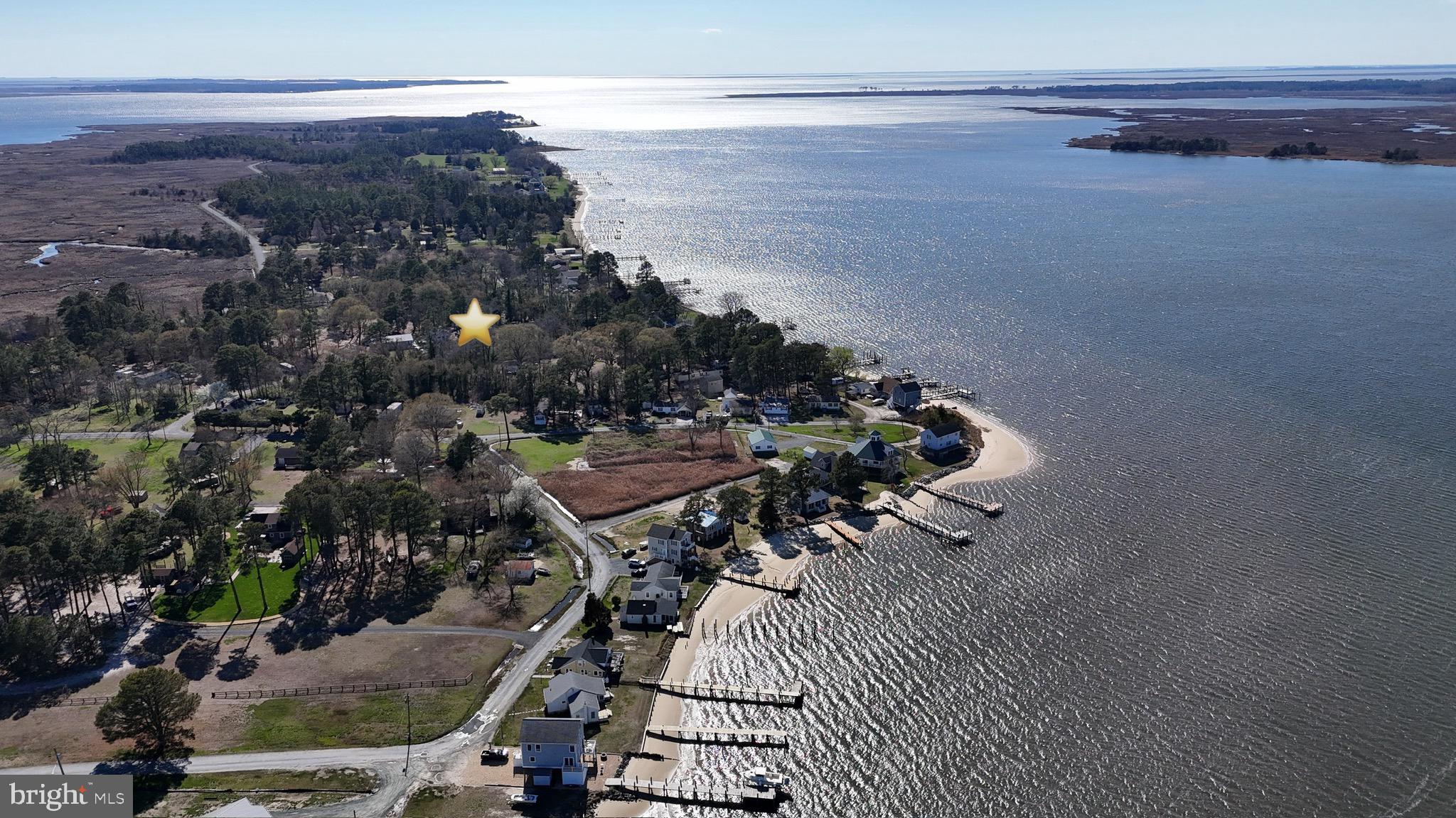 26465 Mason Webster Road Princess Anne, MD 21853 - Photo 35 of 56 a picture of city view with lot of lake