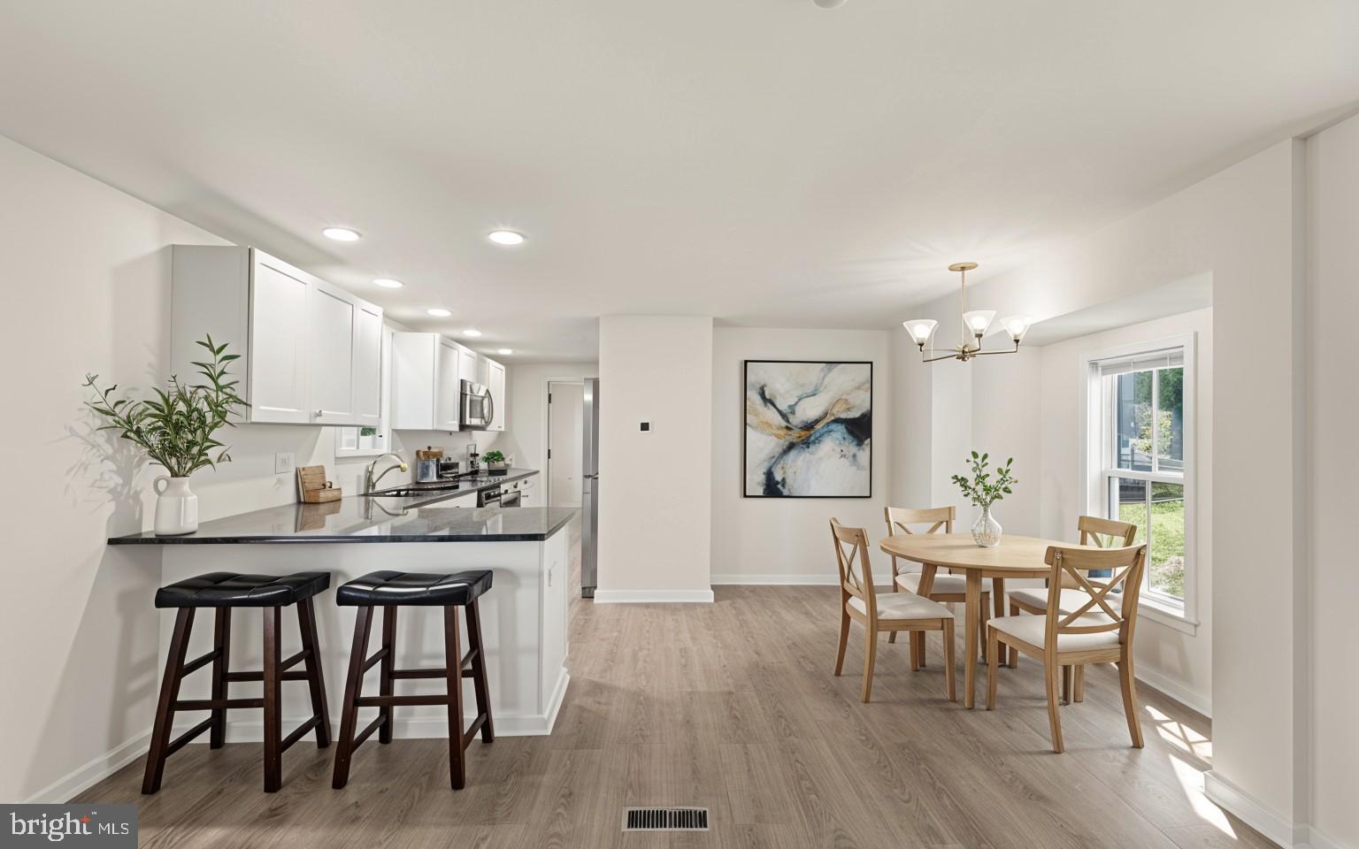 26465 Mason Webster Road Princess Anne, MD 21853 - Photo 7 of 63 Virtually Staged Kitchen with Breakfast Nook