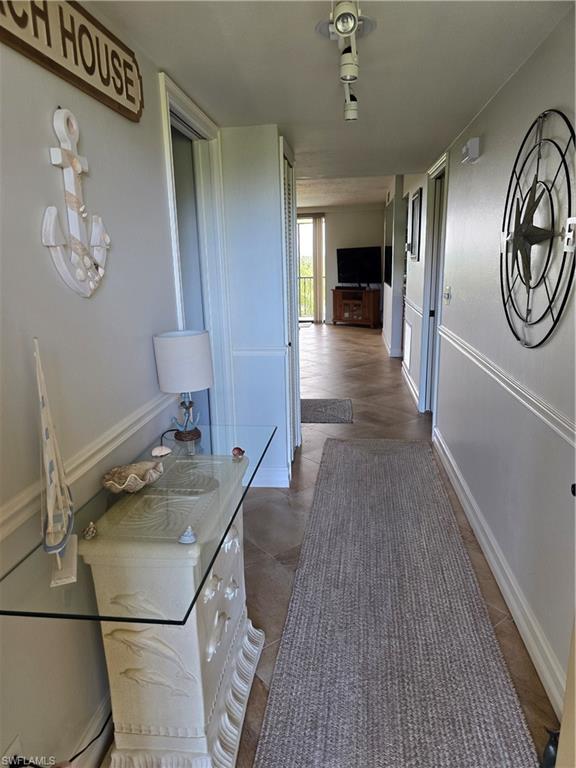 7119 Lakeridge View Court, Unit 302 Fort Myers, FL 33907 - Photo 2 of 44 a bathroom with a sink and a mirror