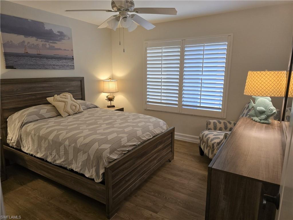 7119 Lakeridge View Court, Unit 302 Fort Myers, FL 33907 - Photo 7 of 44 a bedroom with a bed and window
