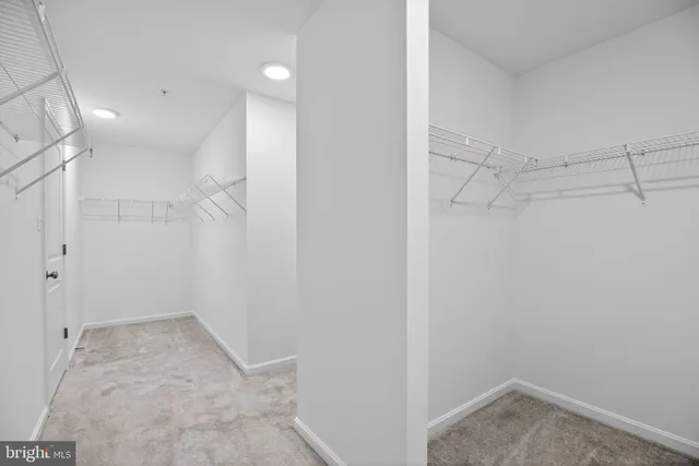 a view of a room with racks on the wall