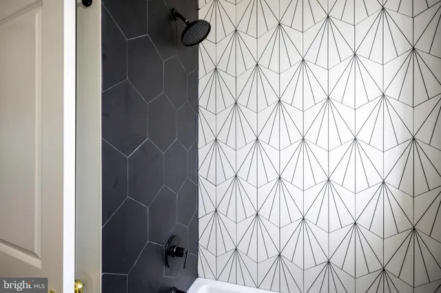 a bathroom with a sink and a shower curtain