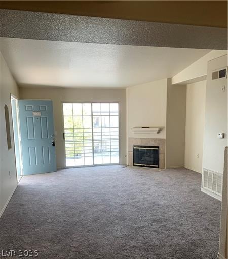 3318 North Decatur Boulevard, Unit 2093 Las Vegas, NV 89130 - Photo 2 of 10 A comfortable living area, ready for your personal touch, features a cozy fireplace and sliding glass doors.