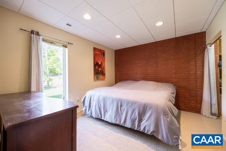 3669 Stony Point Road Charlottesville, VA 22911 - Photo 54 of 75 a bedroom with a bed and a window