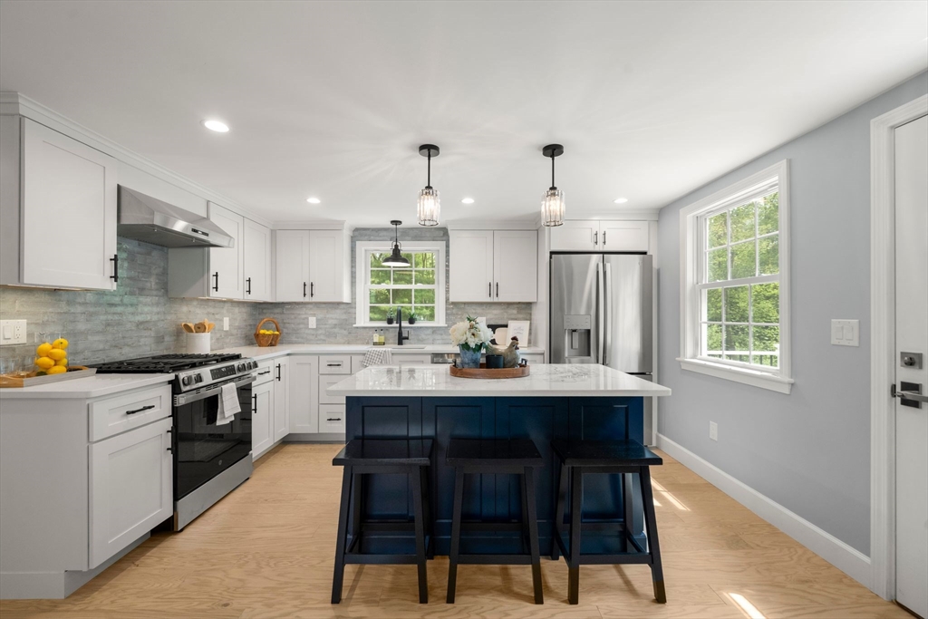 16 Churchill Road Plympton, MA 02367 - Photo 4 of 42 a kitchen with stainless steel appliances a sink a stove a refrigerator and cabinets