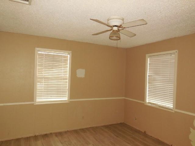 1104 Foreman Road Doyline, LA 71023 - Photo 7 of 11 a view of a room with a window and a ceiling fan