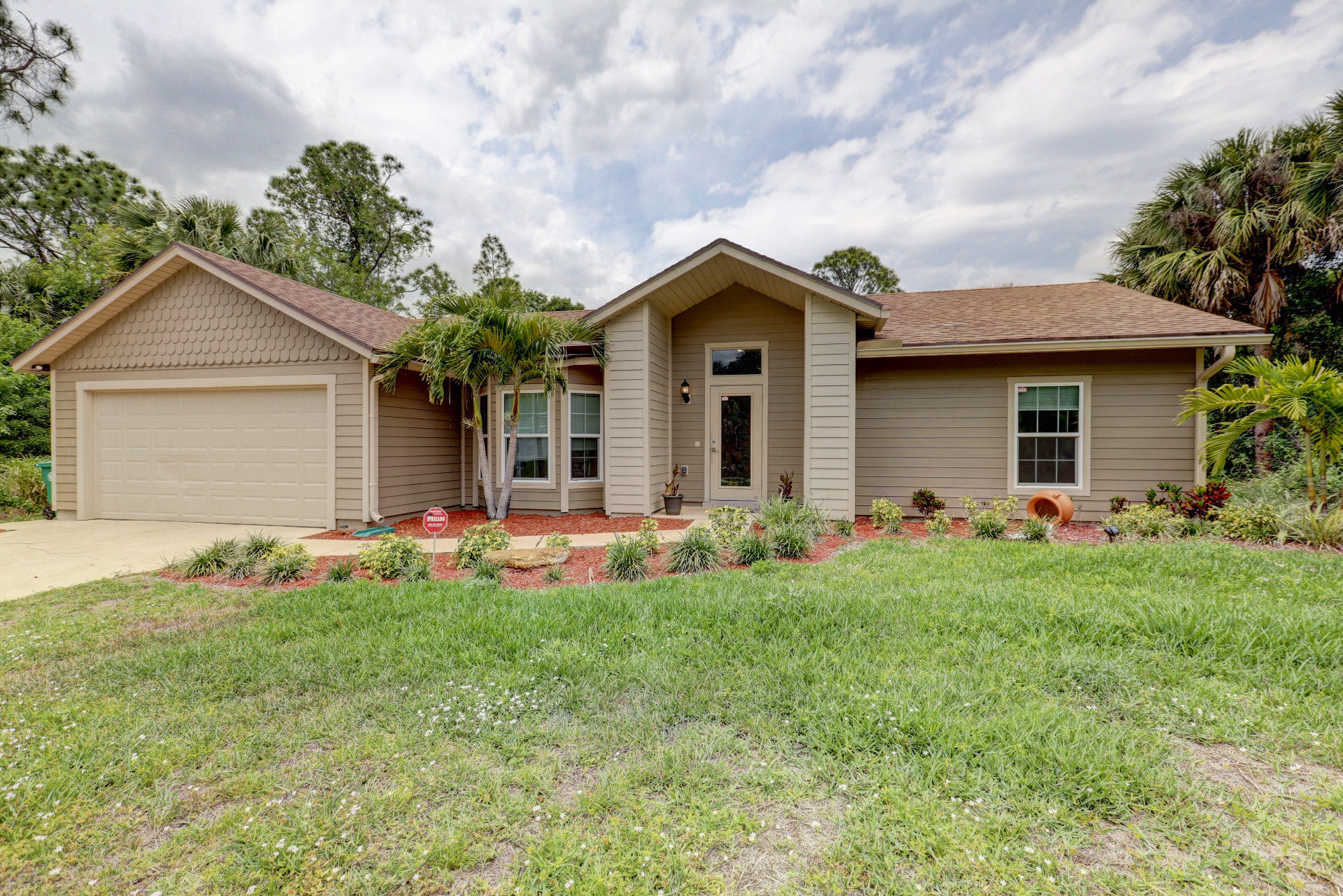 1233 Southwest Herald Road Port St. Lucie, FL 34953 - Photo 2 of 26 04_c89a7969_70_71_72_73