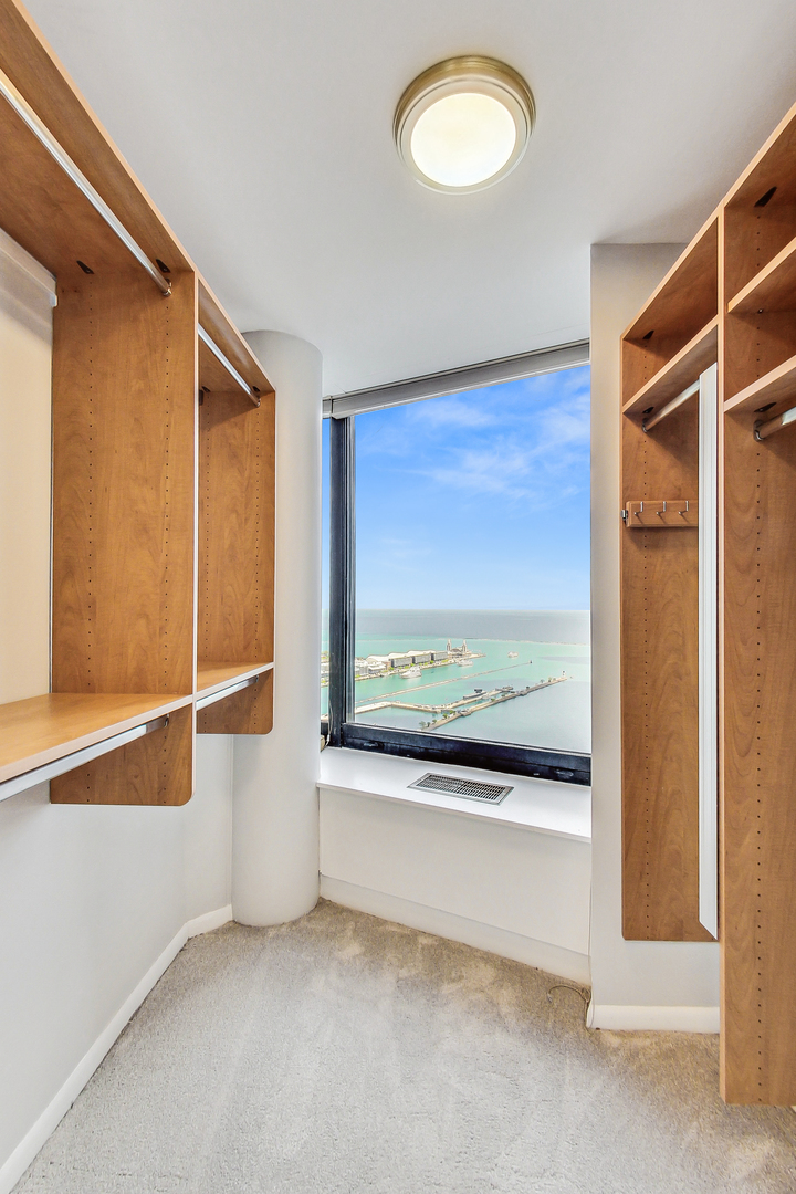 155 North Harbor Drive, Unit 4804 Chicago, IL 60601 - Photo 16 of 31 a view of a room with wooden floor and window