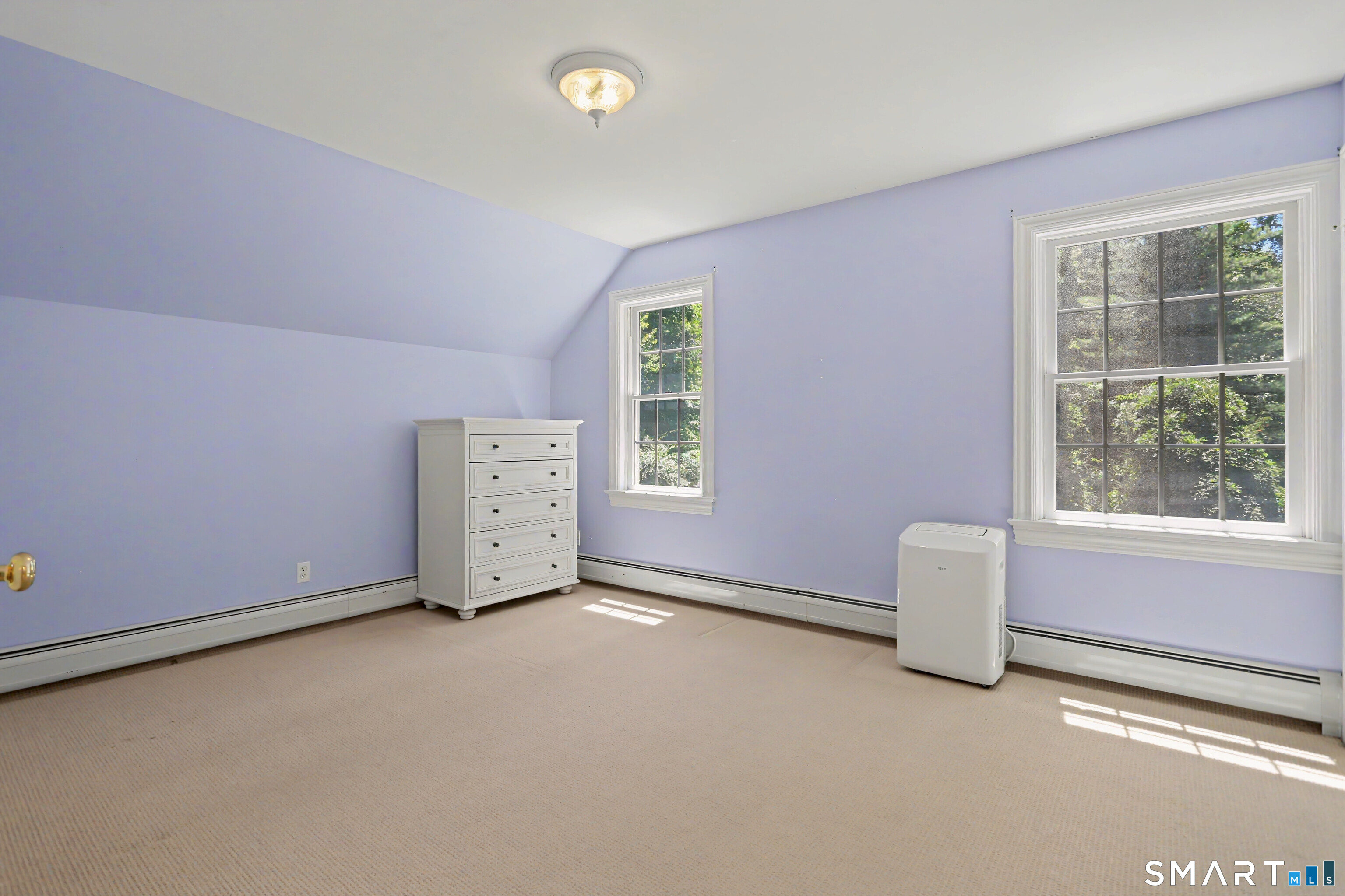 31 Vista Road Wilton, CT 06897 - Photo 24 of 34 Bright bedroom from the 2008 addition with generous space and natural light.