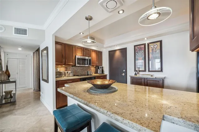 a view of a dining room with furniture