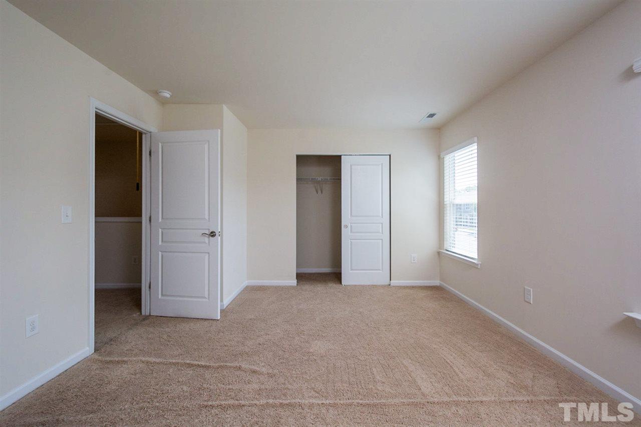 2926 Berkeley Springs Place Raleigh, NC 27616 - Photo 11 of 13 a view of an empty room and window