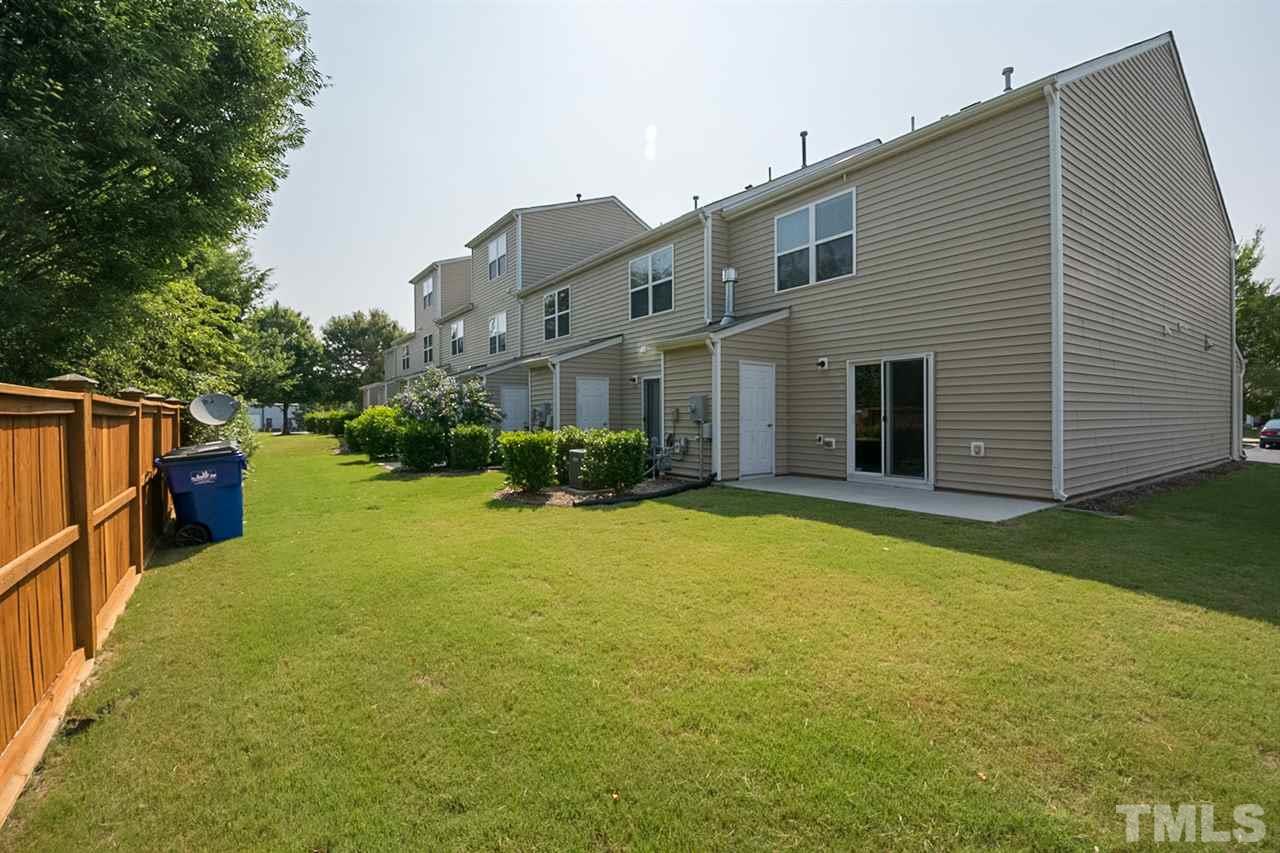 2926 Berkeley Springs Place Raleigh, NC 27616 - Photo 13 of 13 a view of a house with a yard