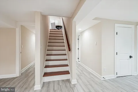 a view of entryway with wooden floor