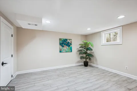 a view of livingroom with wooden floor