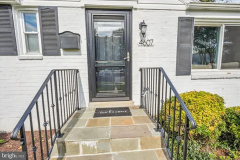 a view of a balcony with a potted plant