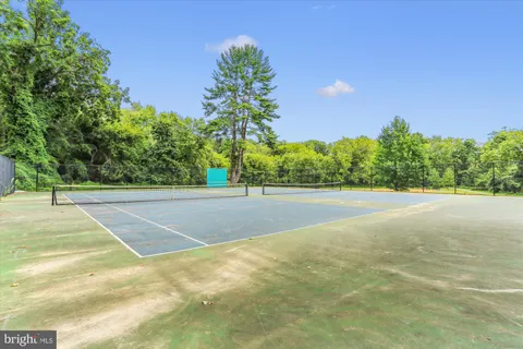 a view of swimming pool and a yard