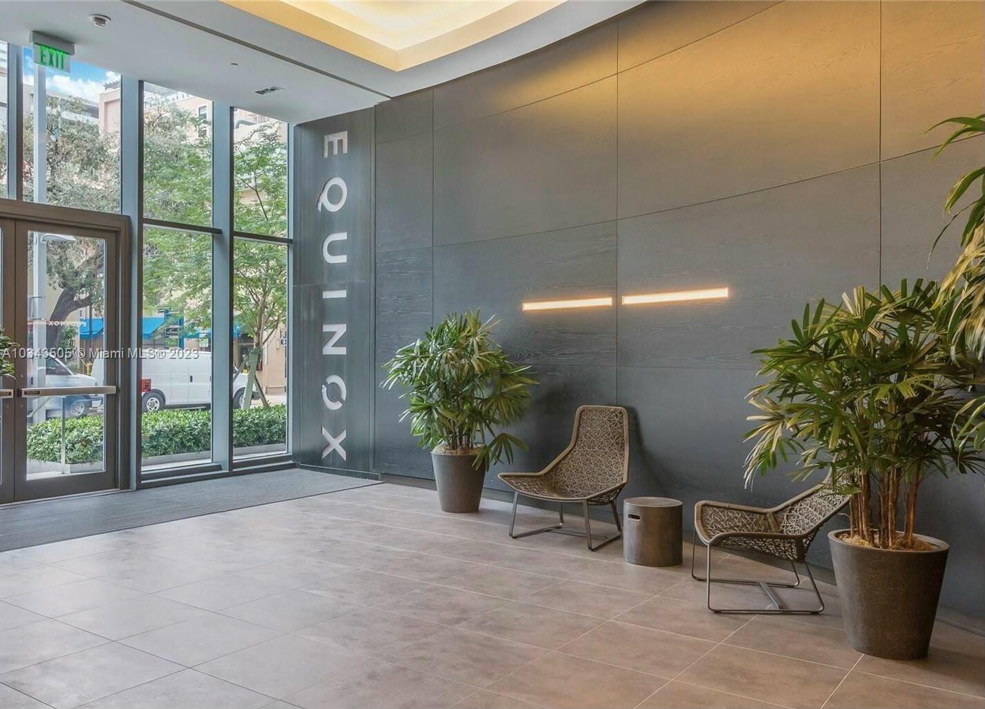55 Southwest 9th Street, Unit 3209 Miami, FL 33130 - Photo 15 of 35 a living room with furniture and a potted plant