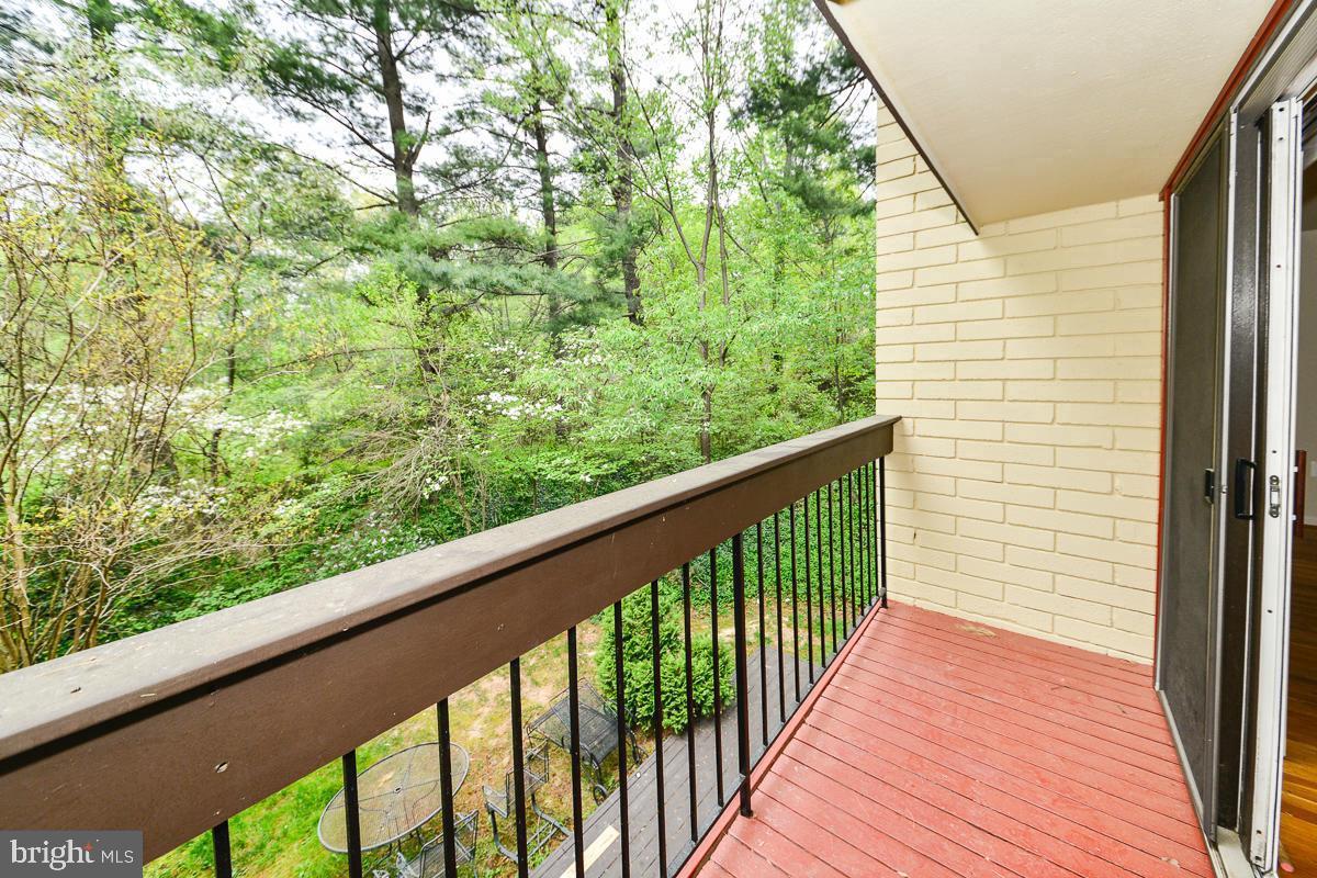 11187 Saffold Way Reston, VA 20190 - Photo 23 of 27 a view of a balcony with wooden floor