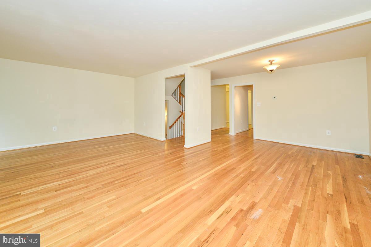 11187 Saffold Way Reston, VA 20190 - Photo 10 of 27 wooden floor in an empty room