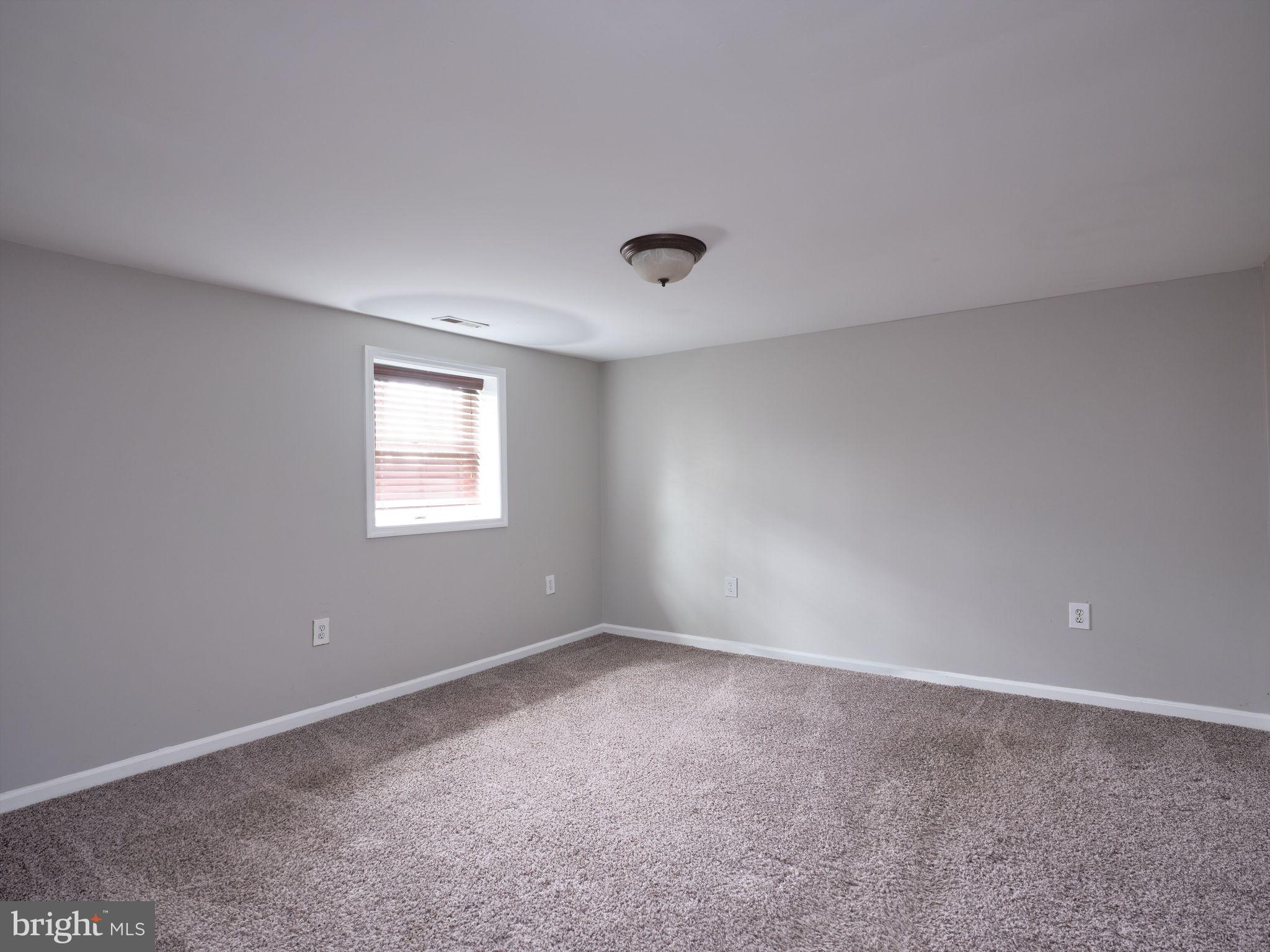 1296 Durham Road Buckingham, PA 18938 - Photo 12 of 13 a view of an empty room with a window