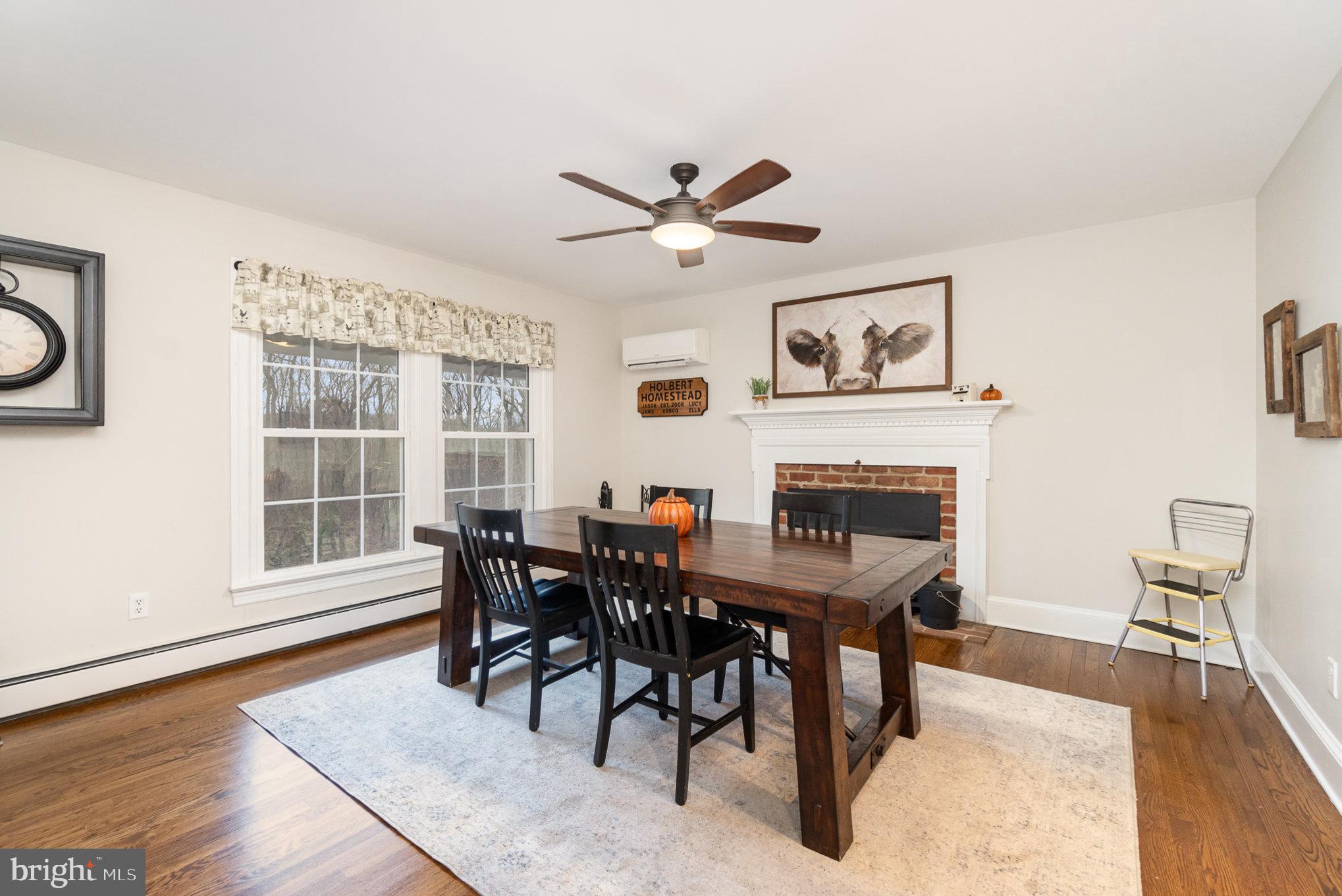 35 North Tannery Road Westminster, MD 21157 - Photo 11 of 47 a view of a dining room with furniture window and wooden floor