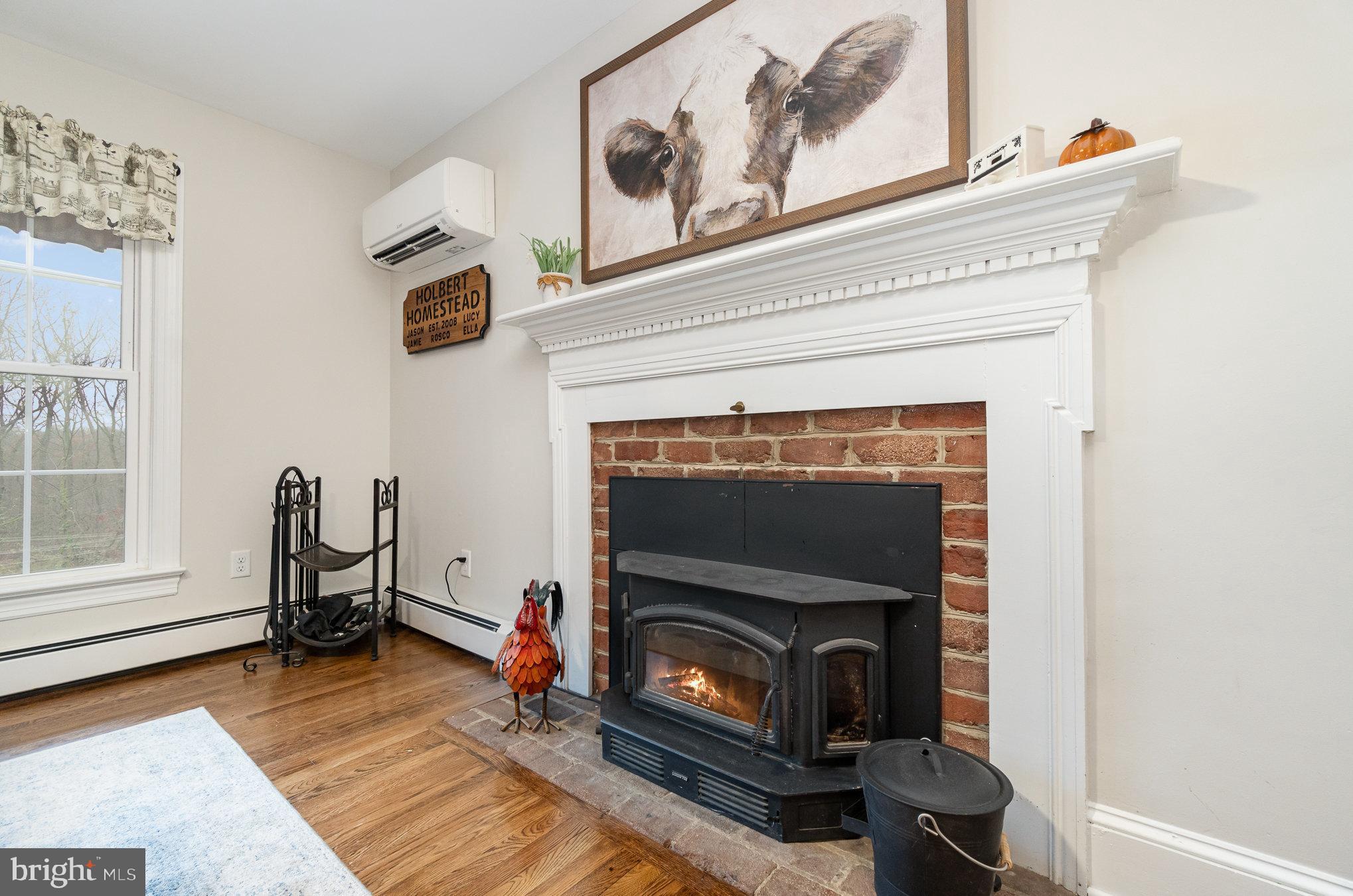 35 North Tannery Road Westminster, MD 21157 - Photo 12 of 47 a living room with furniture and a fireplace